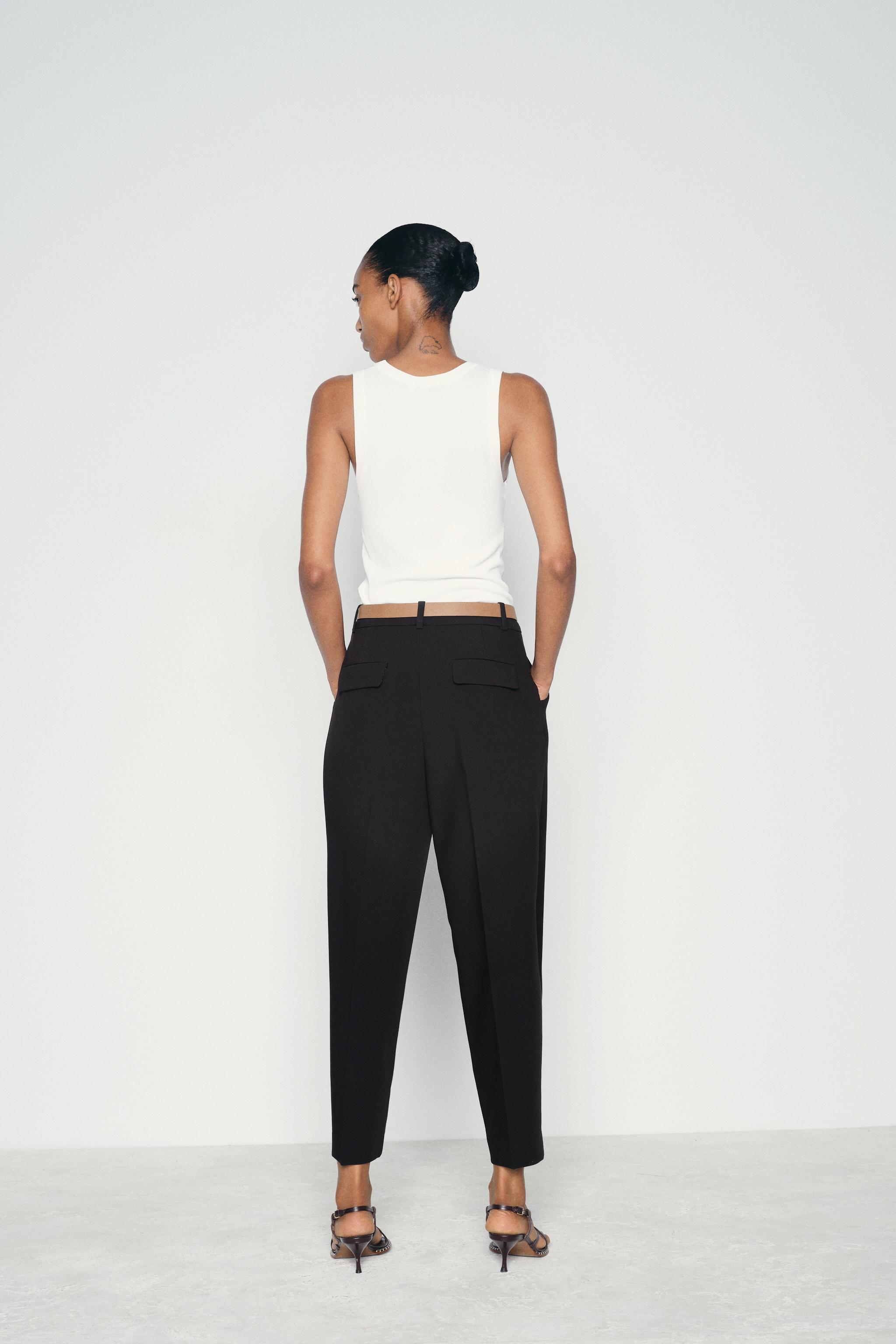 PLEATED PANTS WITH BELT Product Image