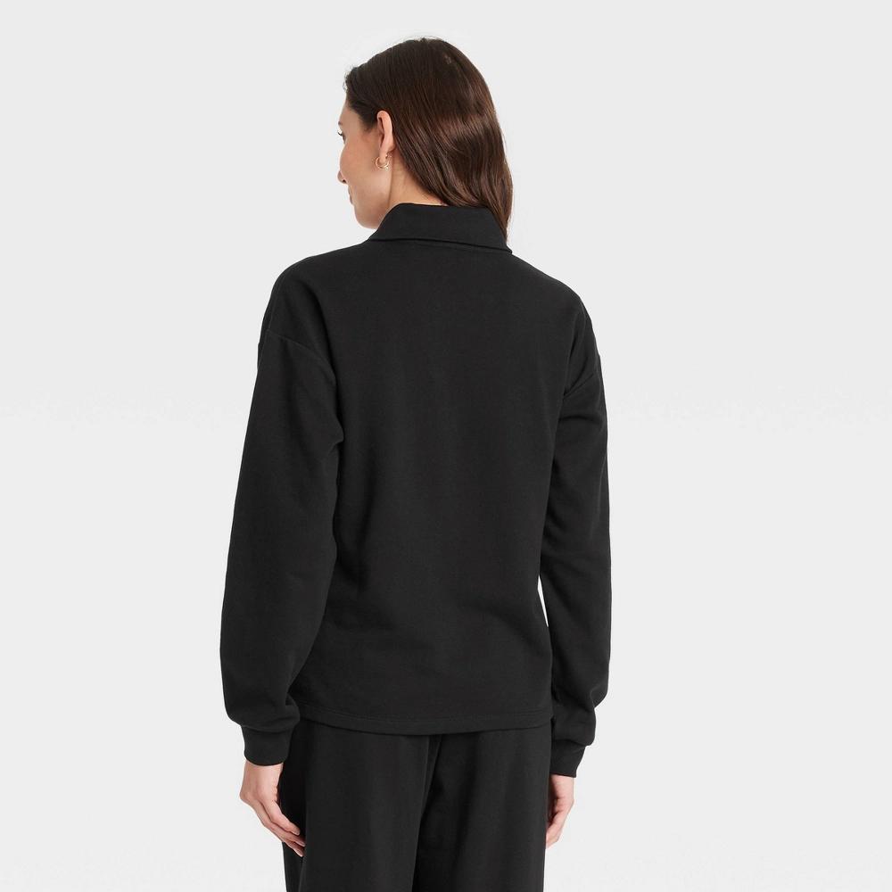 Women's Long Sleeve Polo Shirt - Universal Thread™ Black S Product Image