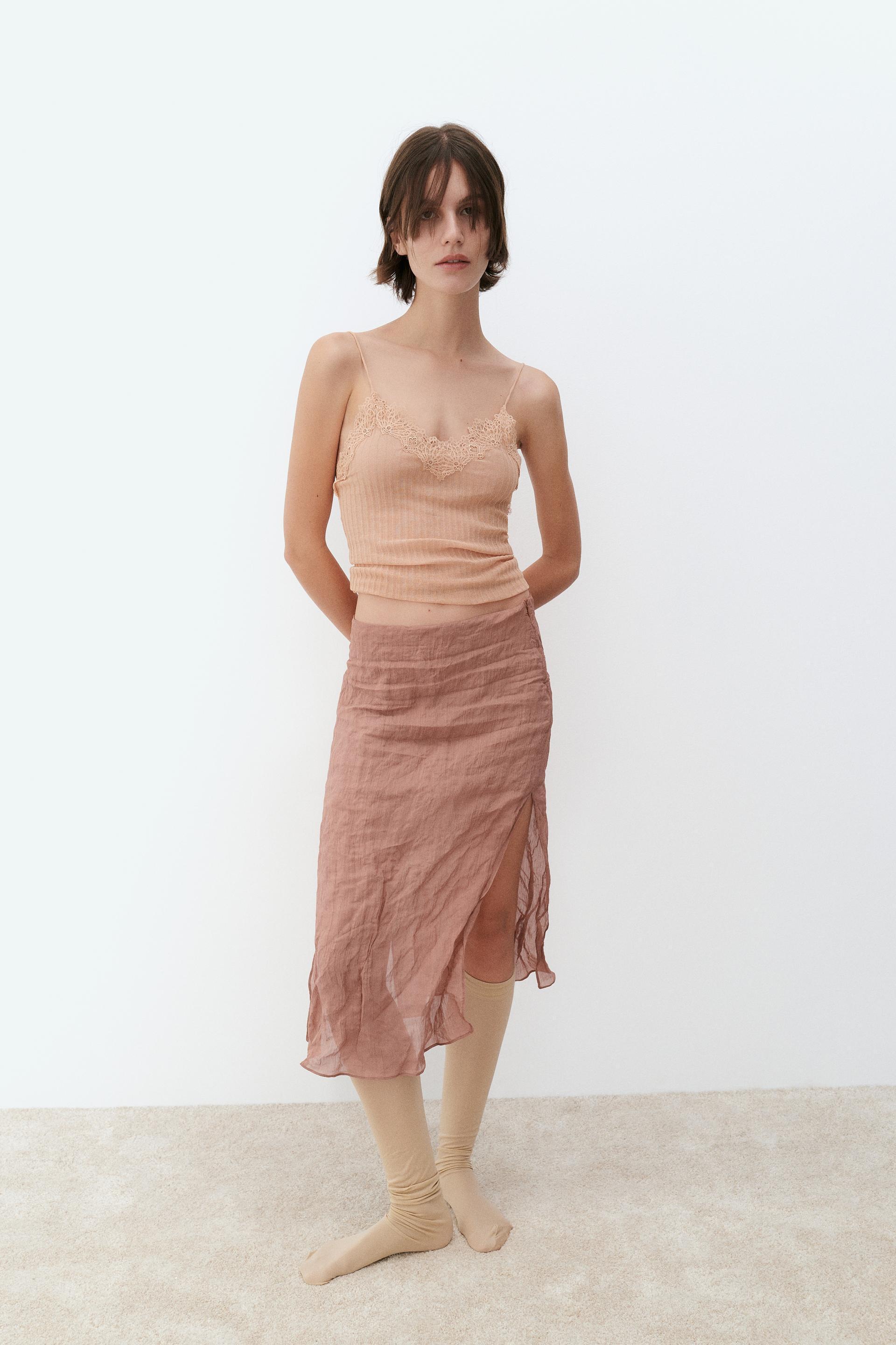 TEXTURED SKIRT WITH METALLIC THREAD AND VENTS Product Image