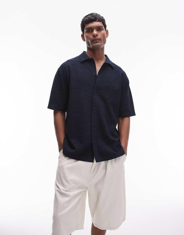 Topman oversized fit mini waffle knit button up jersey shirt in navy Product Image