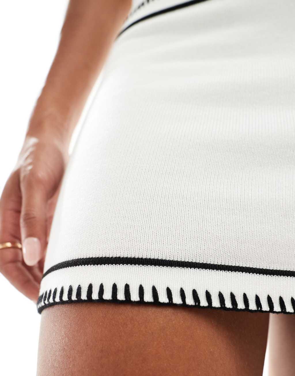 SNDYS knit mini skirt with pocket detail in white with black stitch - part of a set Product Image