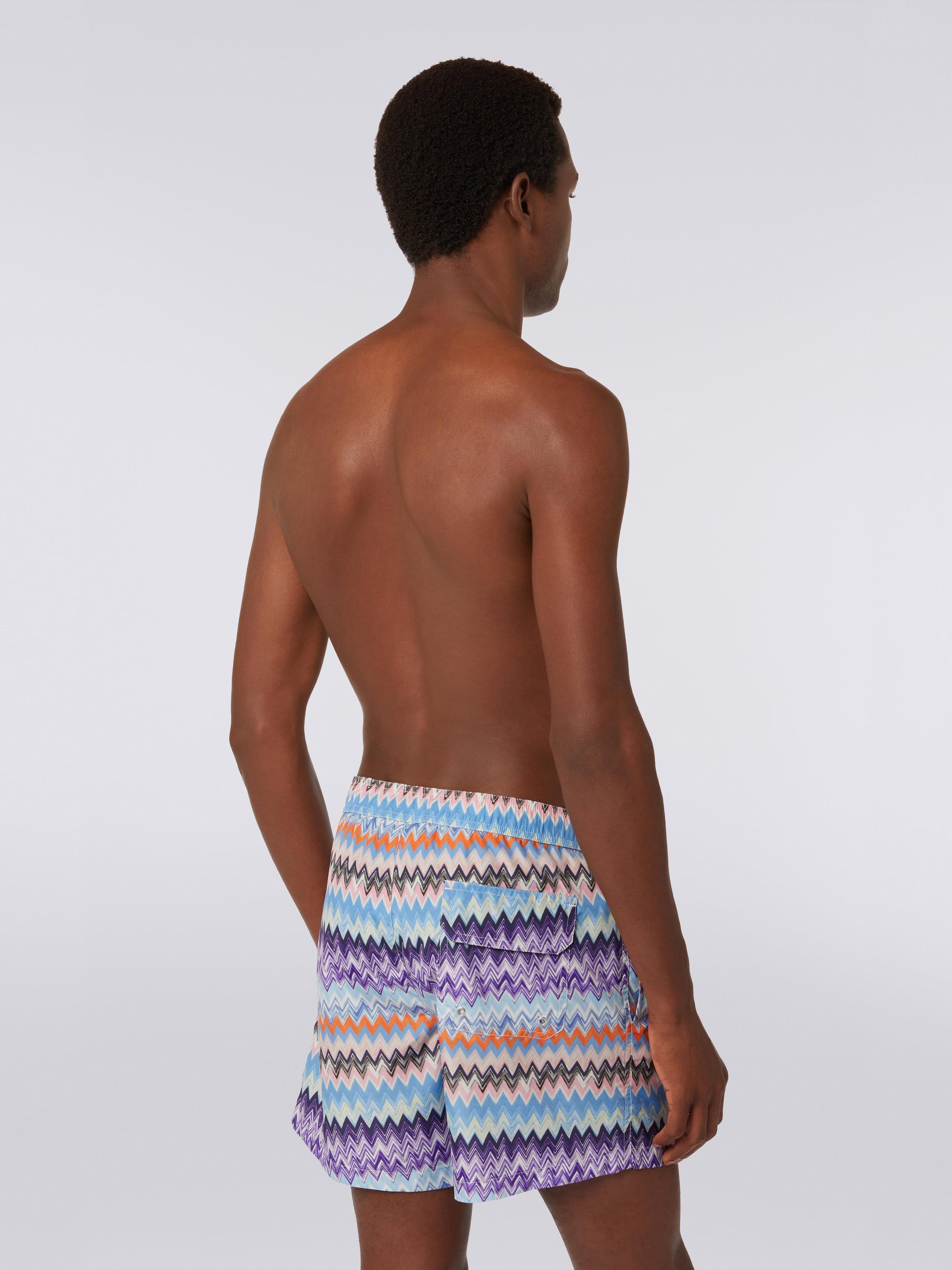 Technical fabric swimming trunks with chevron print Product Image