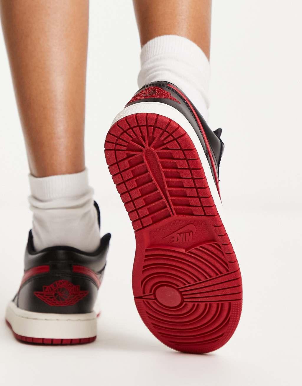 Nike Jordan Air 1 Low sneakers in black and red Product Image