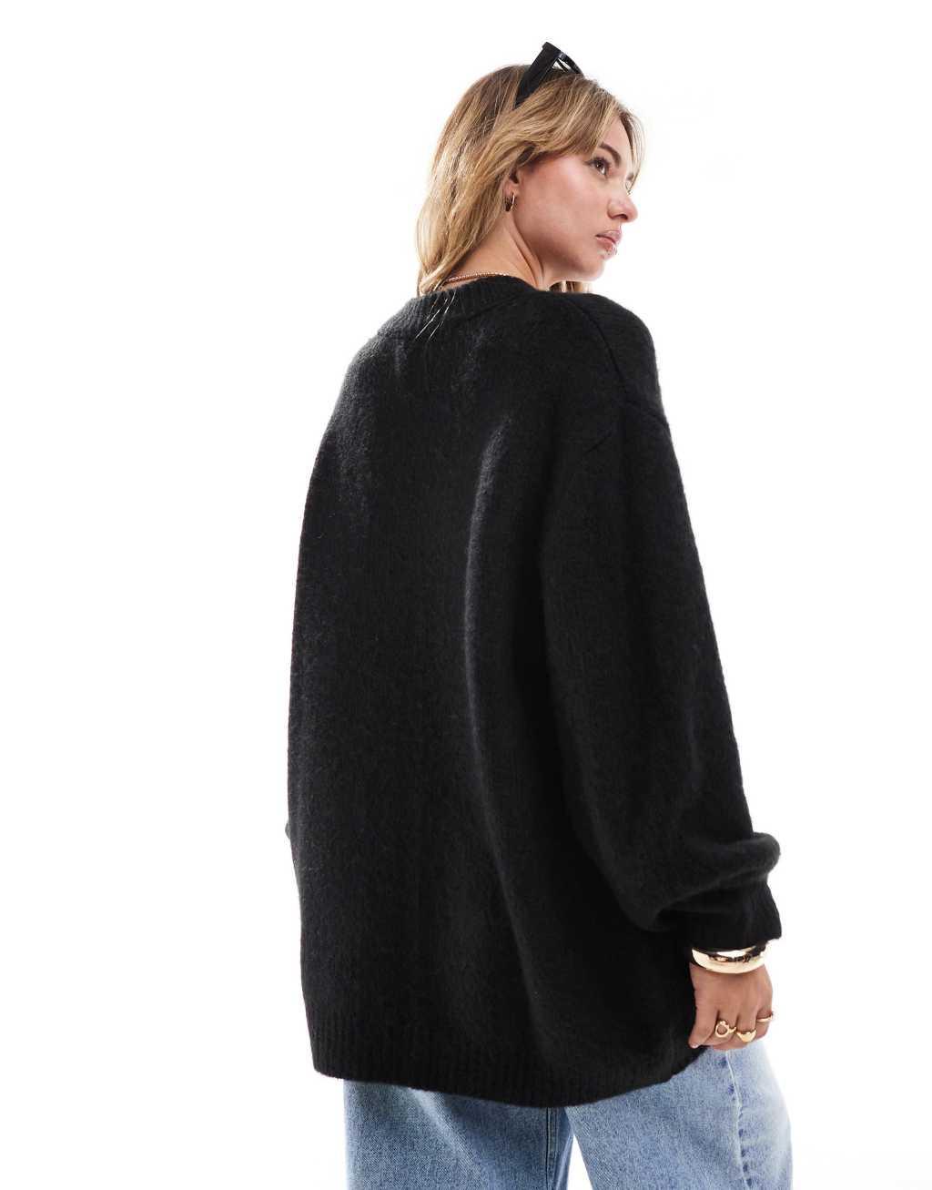 ASOS DESIGN oversized crew neck sweater in black  Product Image