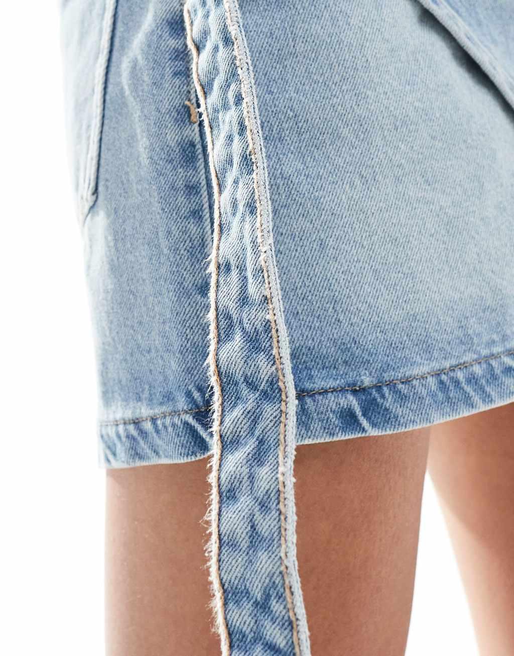 Bershka wrap front denim mini skirt in light blue Product Image