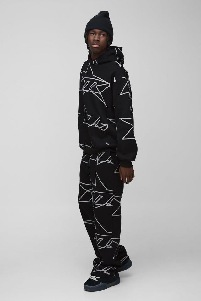 Oversized Star All Over Printed Gusset Flare Hooded Tracksuit | boohooMAN USA Product Image