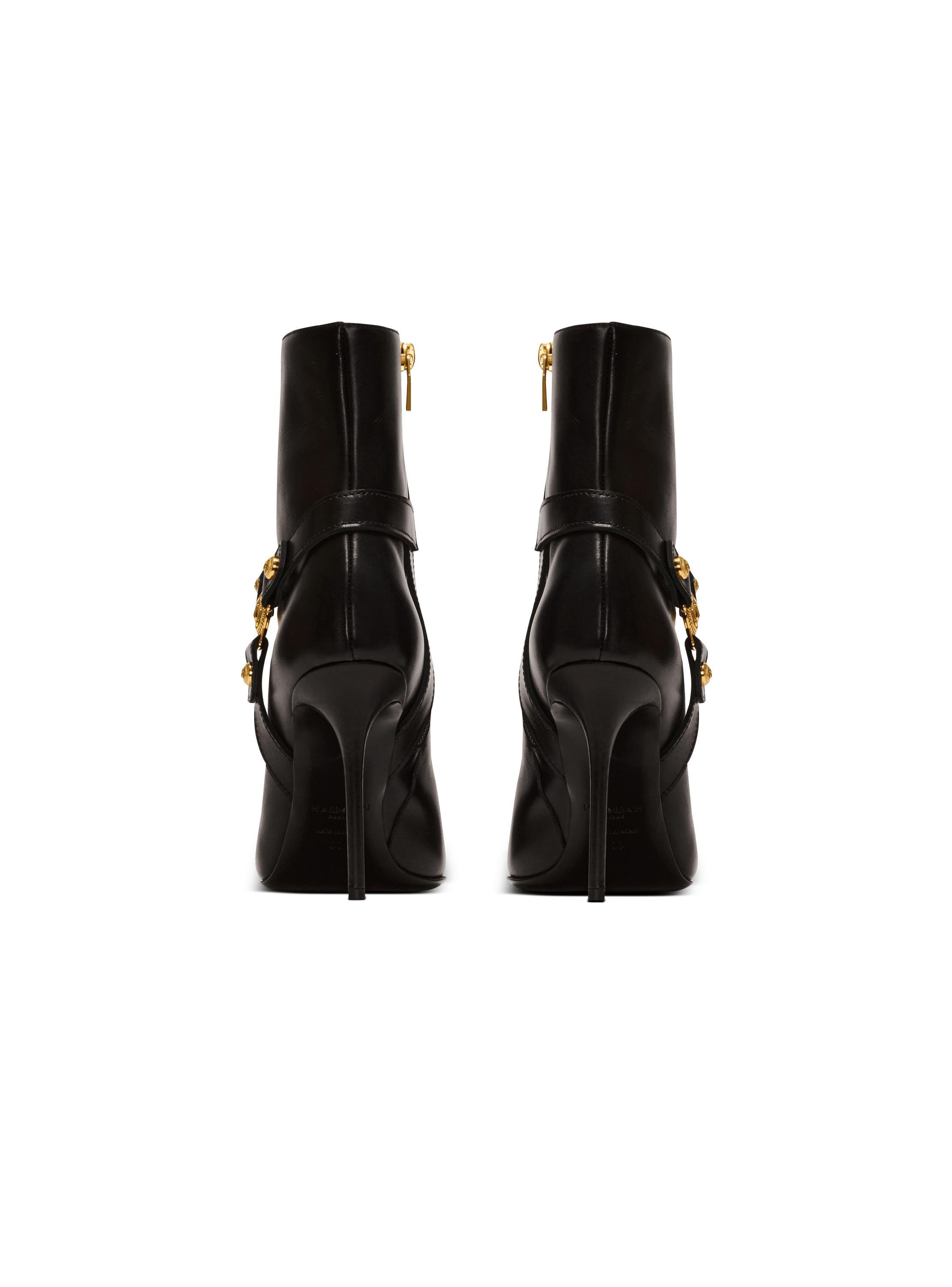 Heeled calfskin Eva ankle boots Product Image