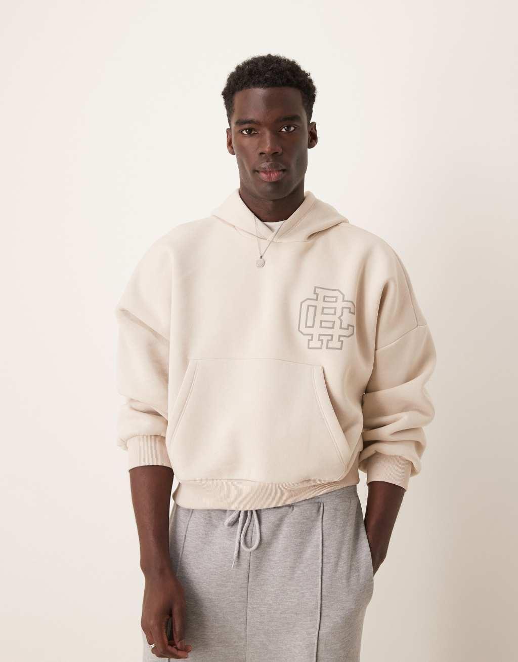 ASOS DESIGN oversized dropped shoulder cropped hoodie with collegiate chest print in oatmeal heather Product Image