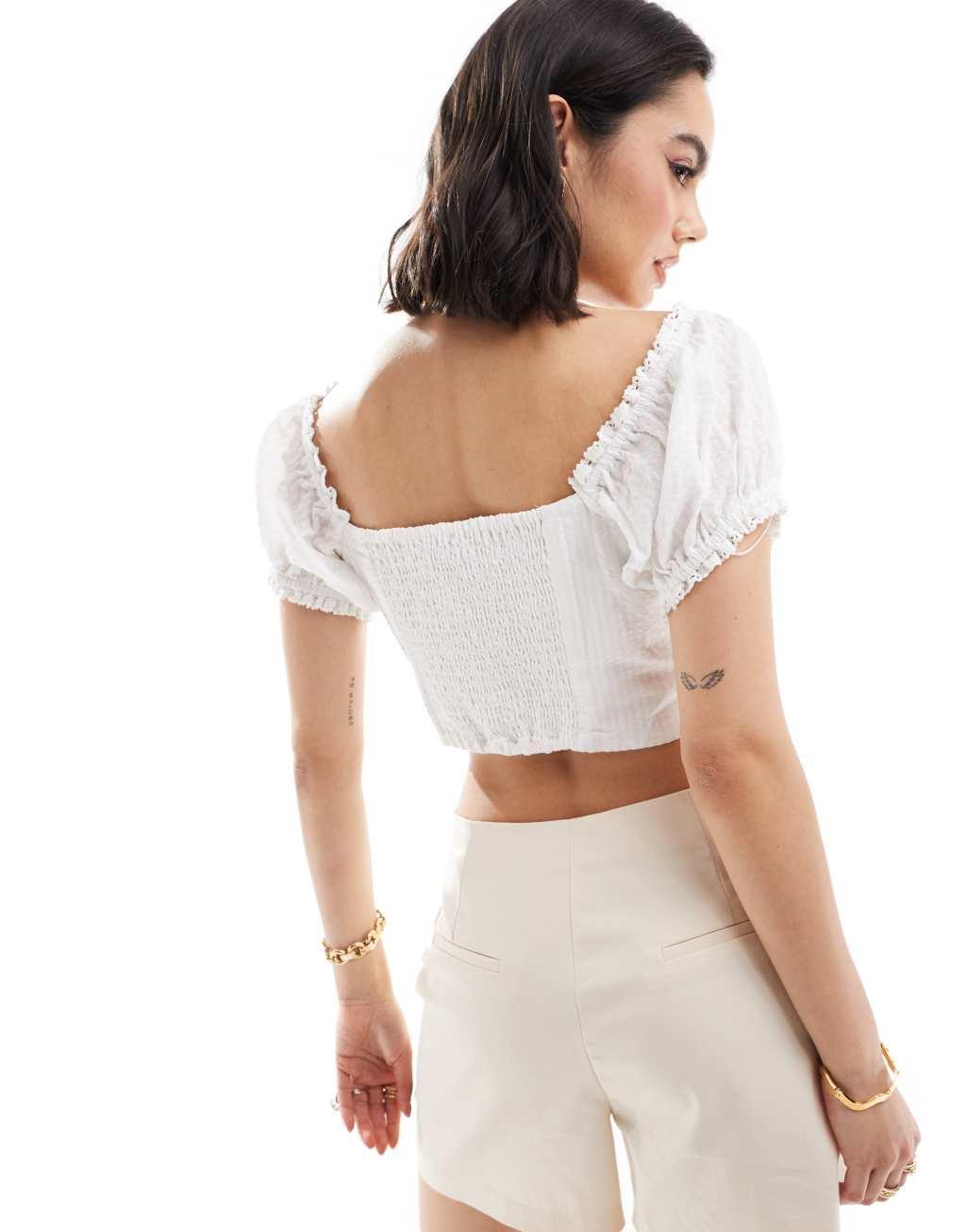 Mango puff sleeve bow front top in white Product Image