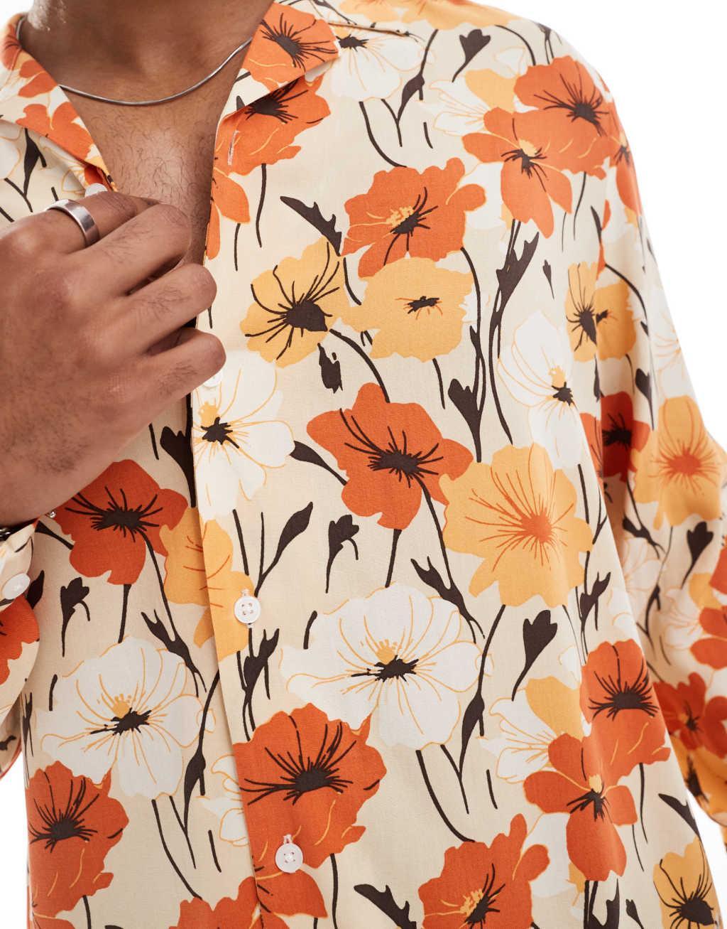 ASOS DESIGN relaxed revere shirt with retro floral print in orange  Product Image