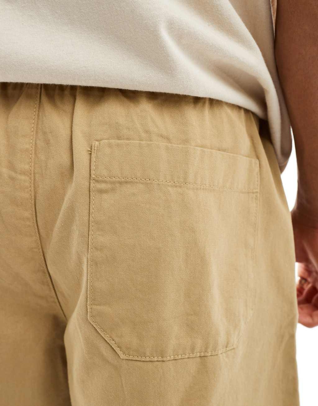 ASOS DESIGN chino shorts in tan Product Image