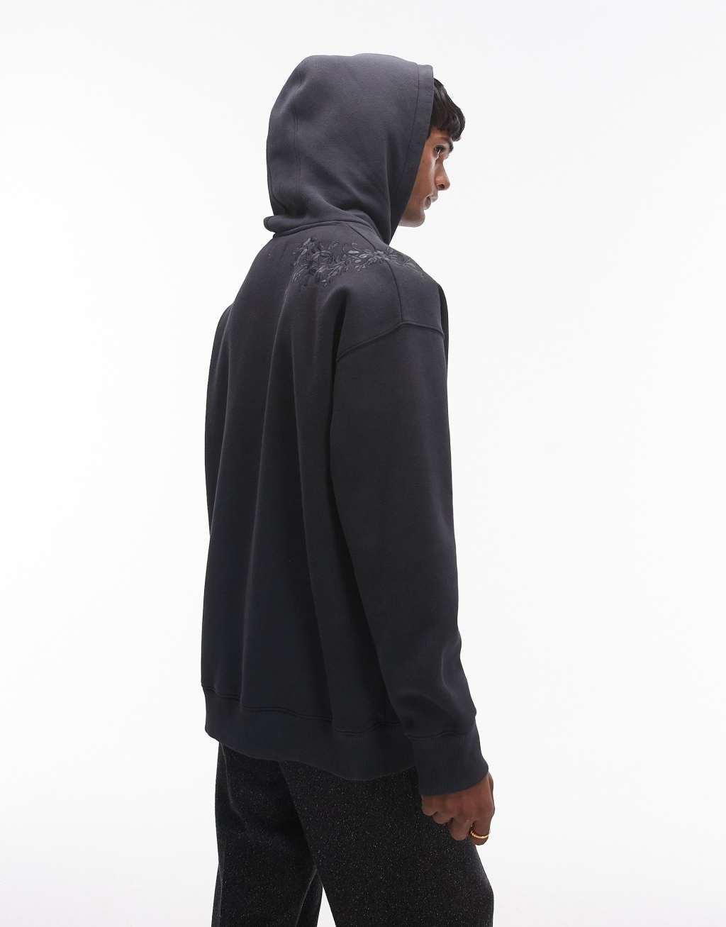 Topman oversized fit hoodie with floral embroidery in washed black Product Image