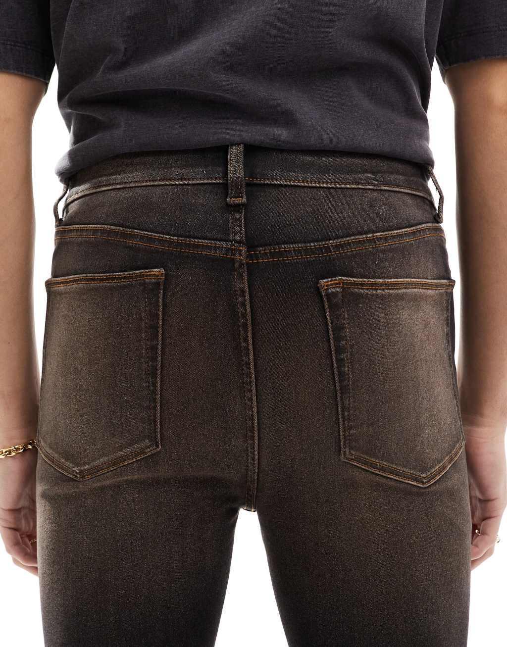 ASOS DESIGN spray on jeans in brown Product Image