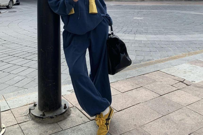 Plain Pocket Detail Oversized Hoodie / Mid Waist Harem Pants Product Image