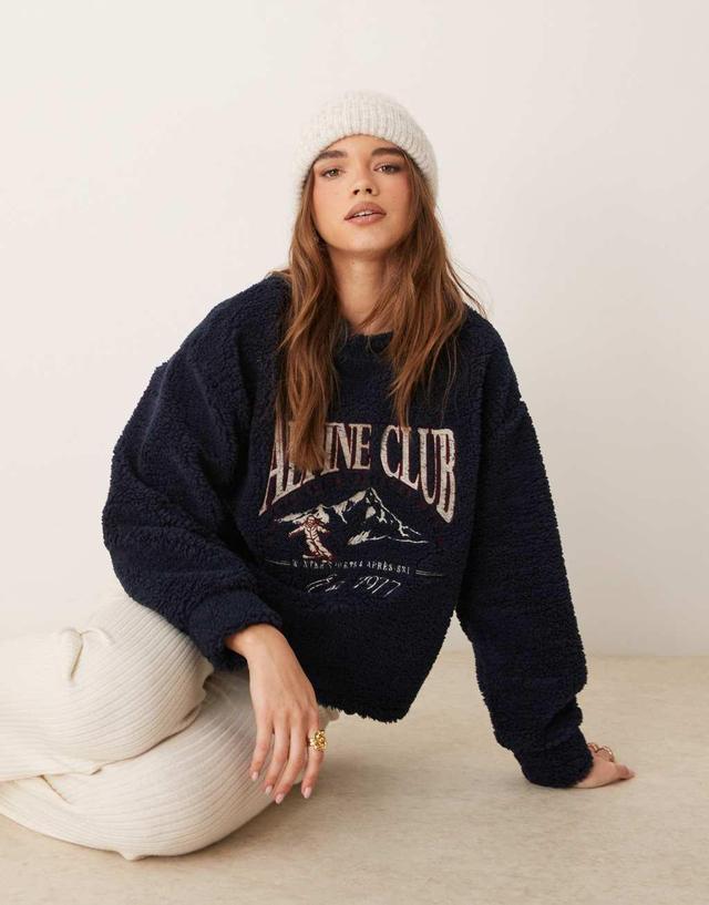 ASOS DESIGN ski club embroidered oversized teddy sweatshirt in navy Product Image