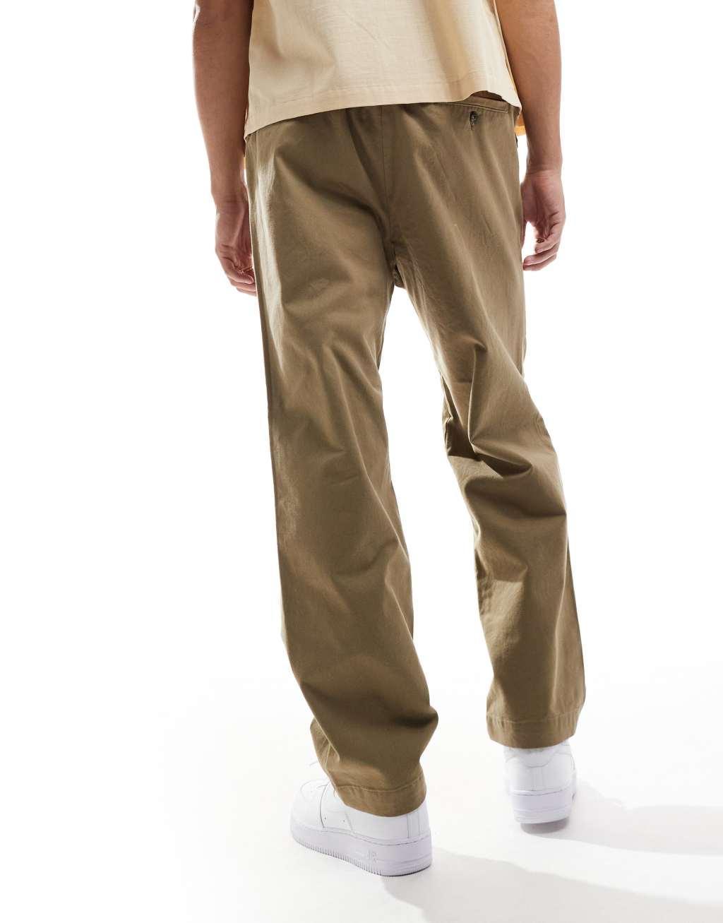 Jack & Jones loose fit pull on chino with pleated front in beige Product Image