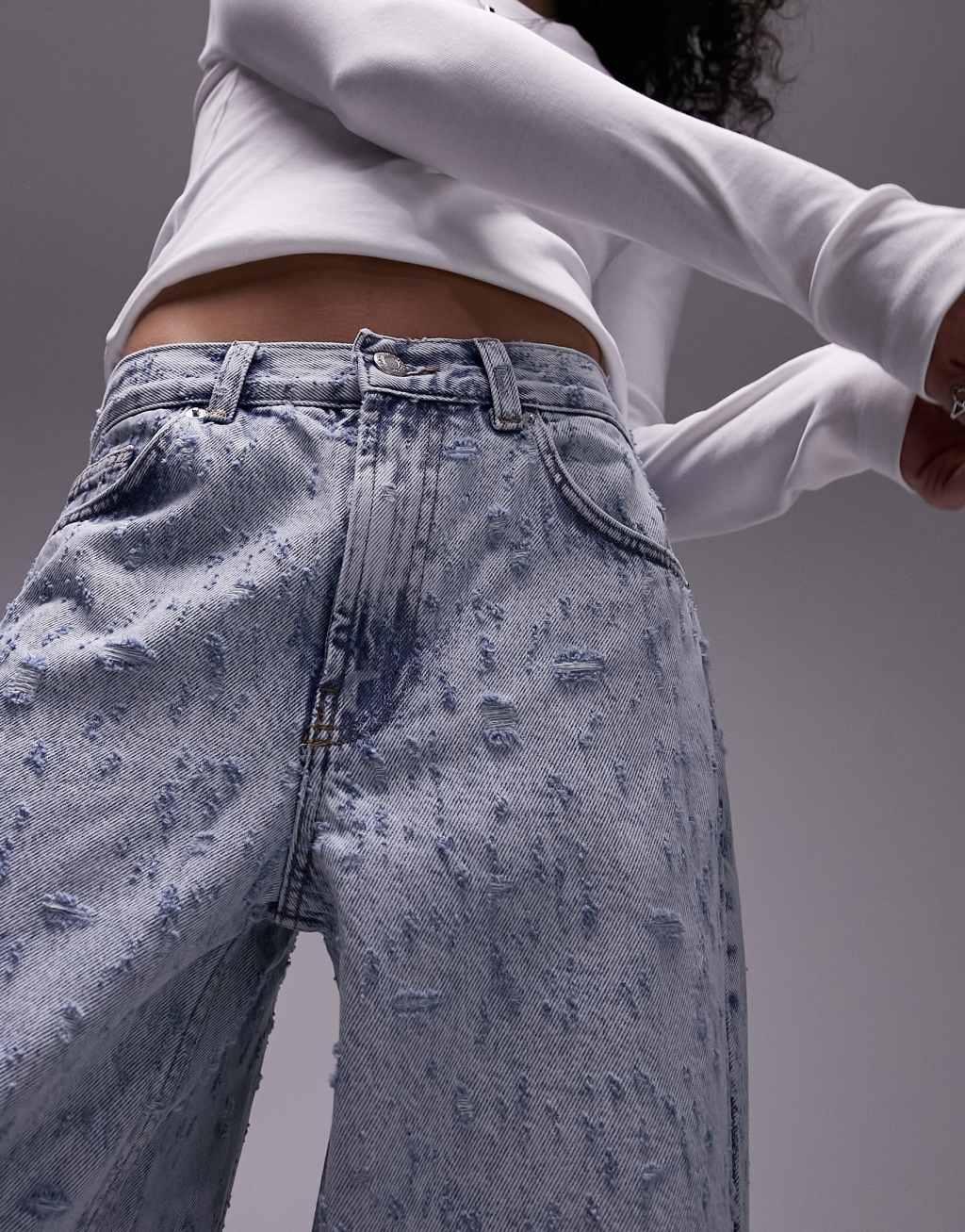 Topshop extreme ripped low-slung boyfriend jeans in bleach Product Image