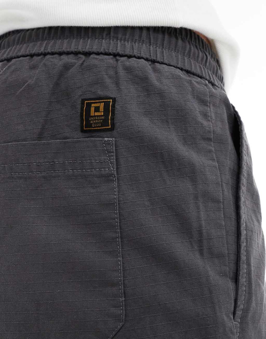 ONLY & SONS pull on parachute shorts in gray Product Image