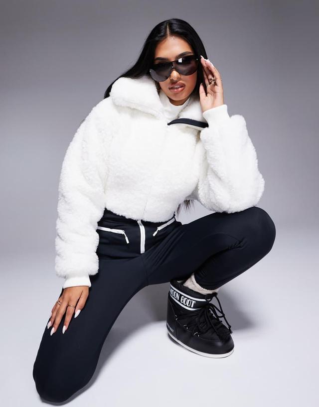 ASOS 4505 Ski suit with faux fur panels and skinny leg in black and white Product Image