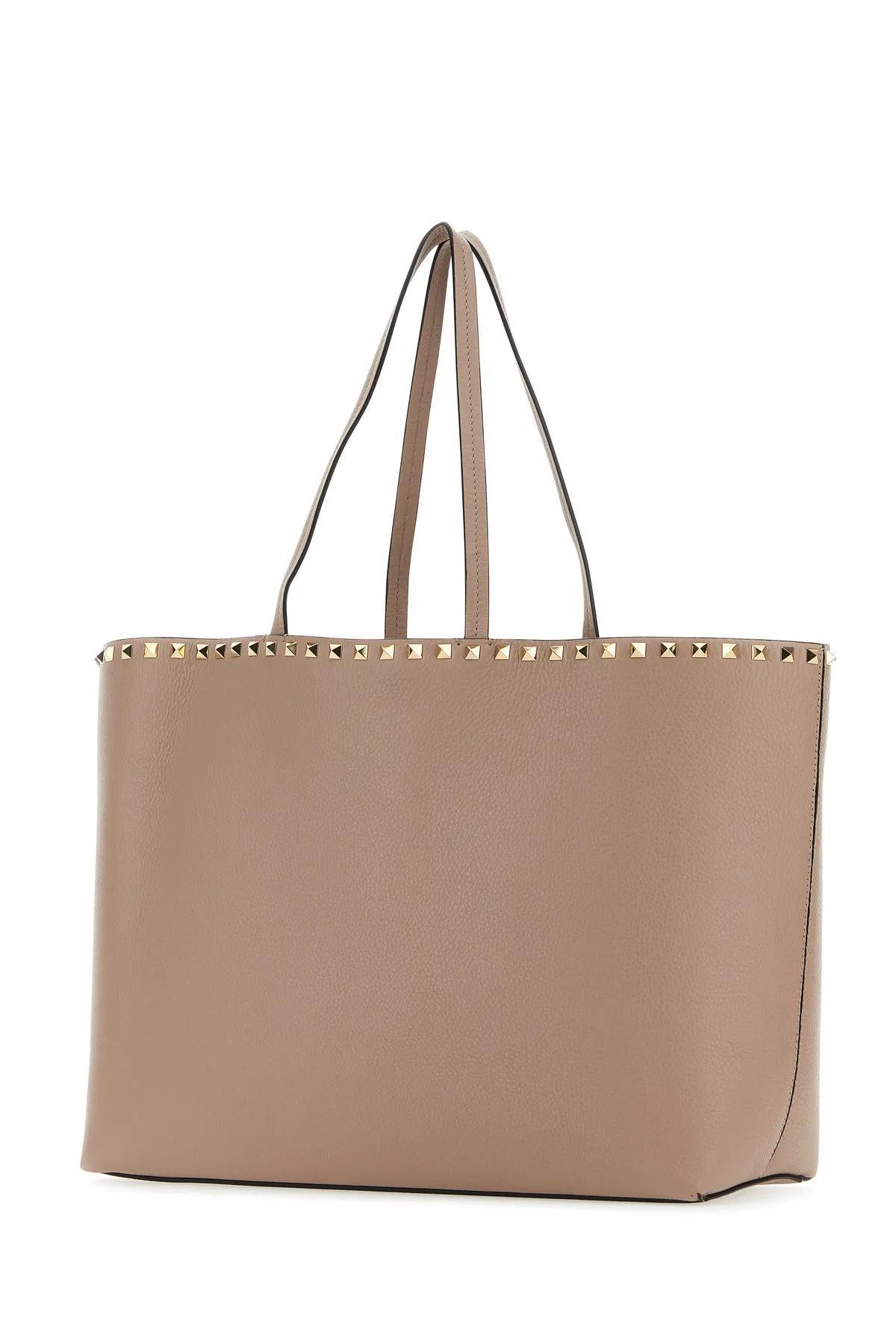 VALENTINO GARAVANI Antiqued Pink Leather Rockstud Shopping Bag In Powder Product Image