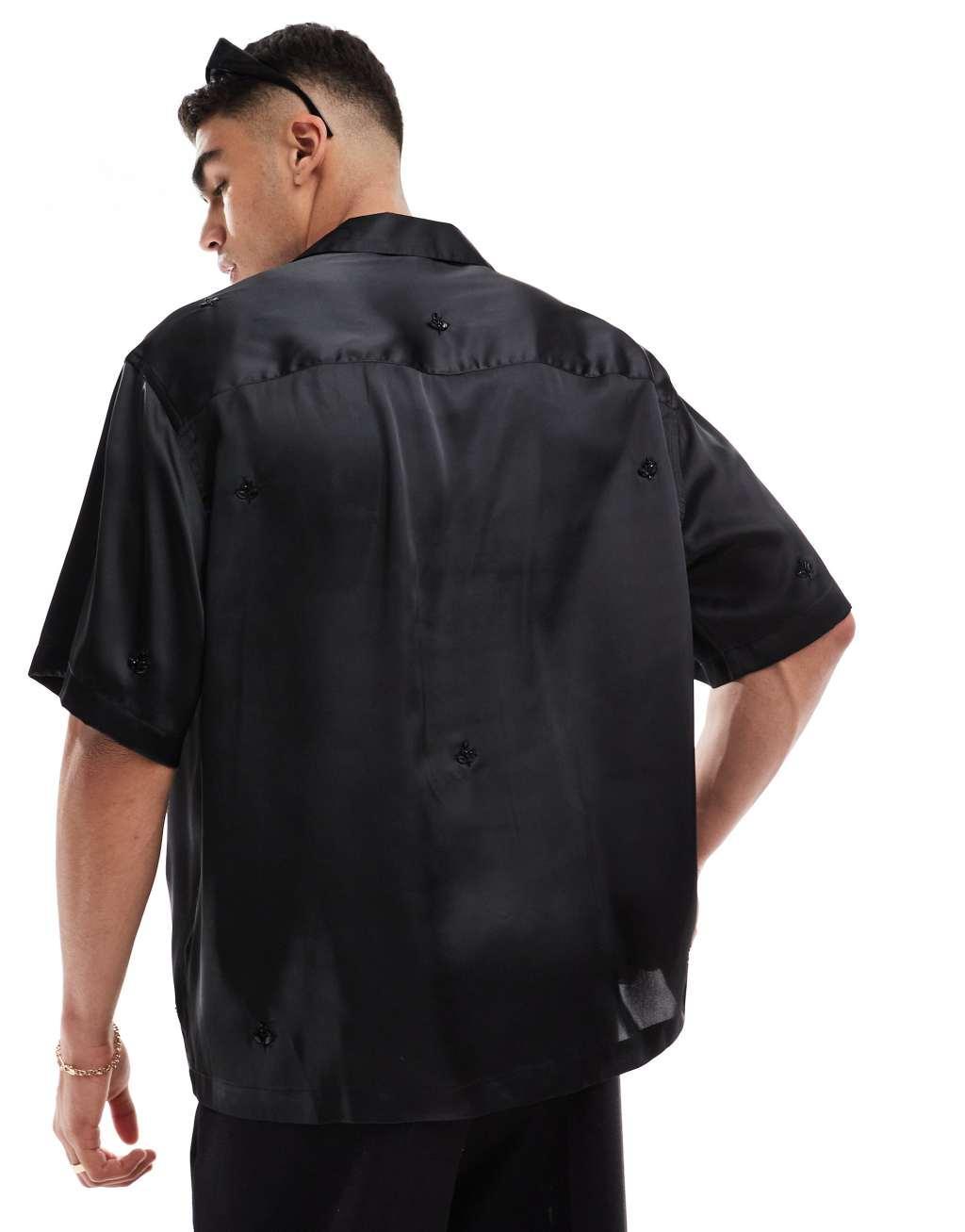 ASOS DESIGN oversized boxy revere embellished satin shirt in black Product Image