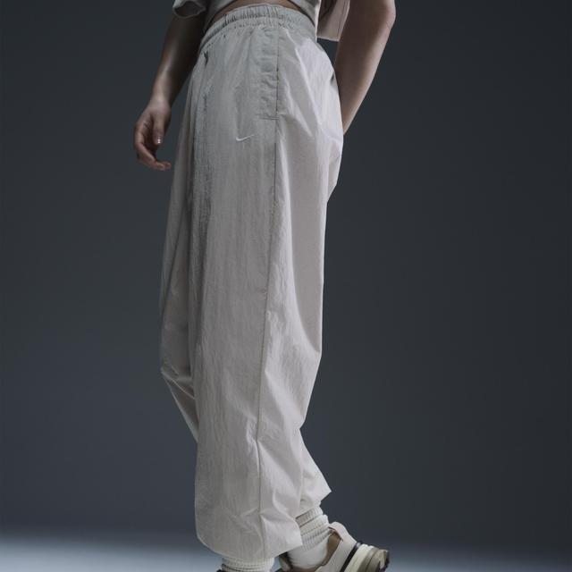 Womens Nike Sportswear Essential Mid-Rise Oversized Woven Jogger Pants Product Image