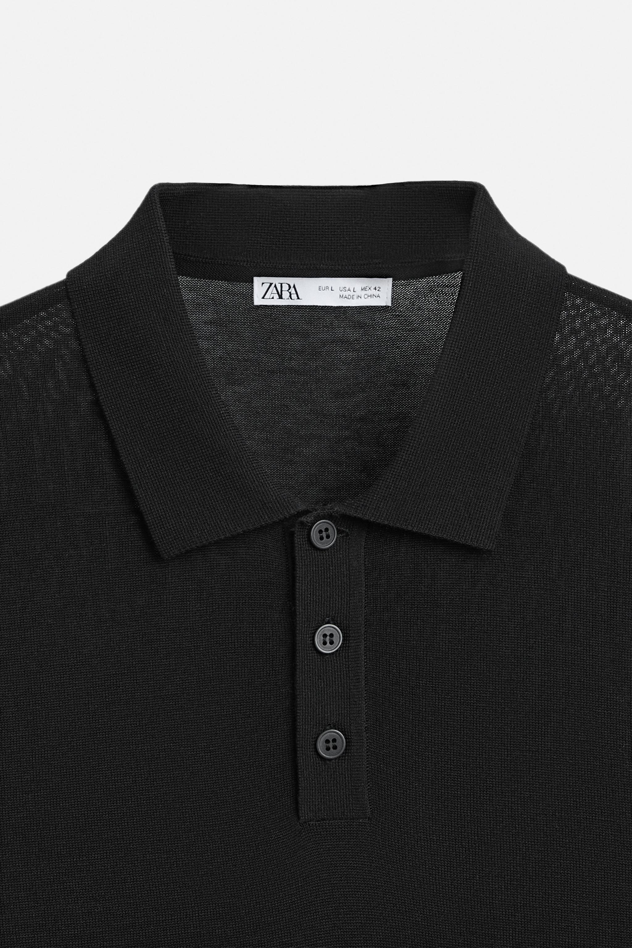 Cotton and silk blend polo shirt. Lapel collar with front button closure and short sleeves. Rib trim. Product Image