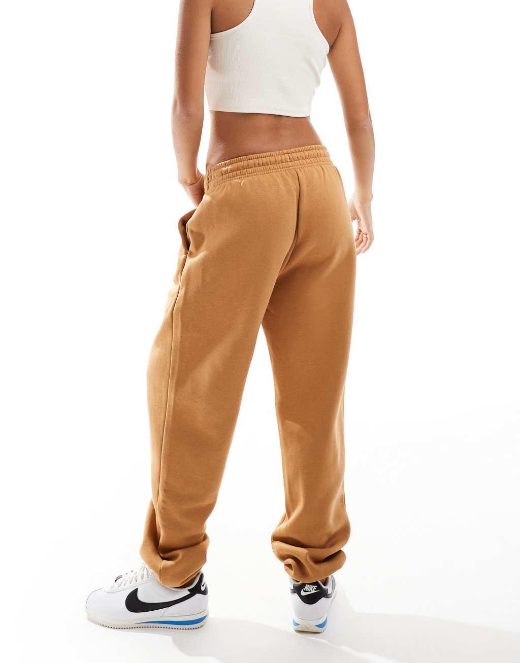 Nike Phoenix Fleece high waisted sweatpants in brown Product Image