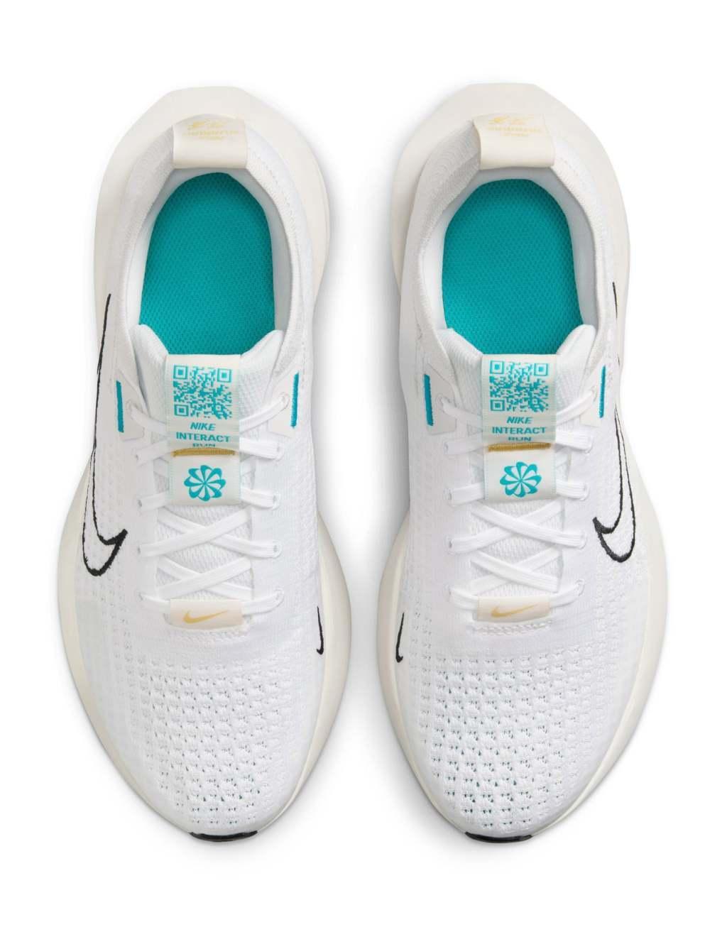 Nike Running Interact sneakers in white Product Image