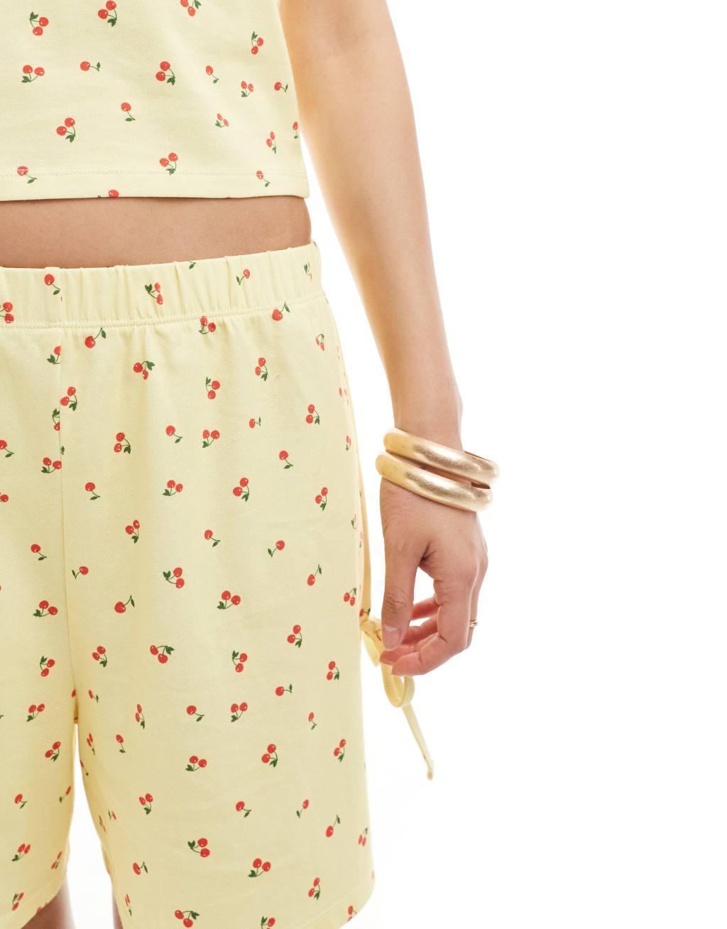 ASOS DESIGN tie side shorts in buttermilk cherry print - part of a set Product Image