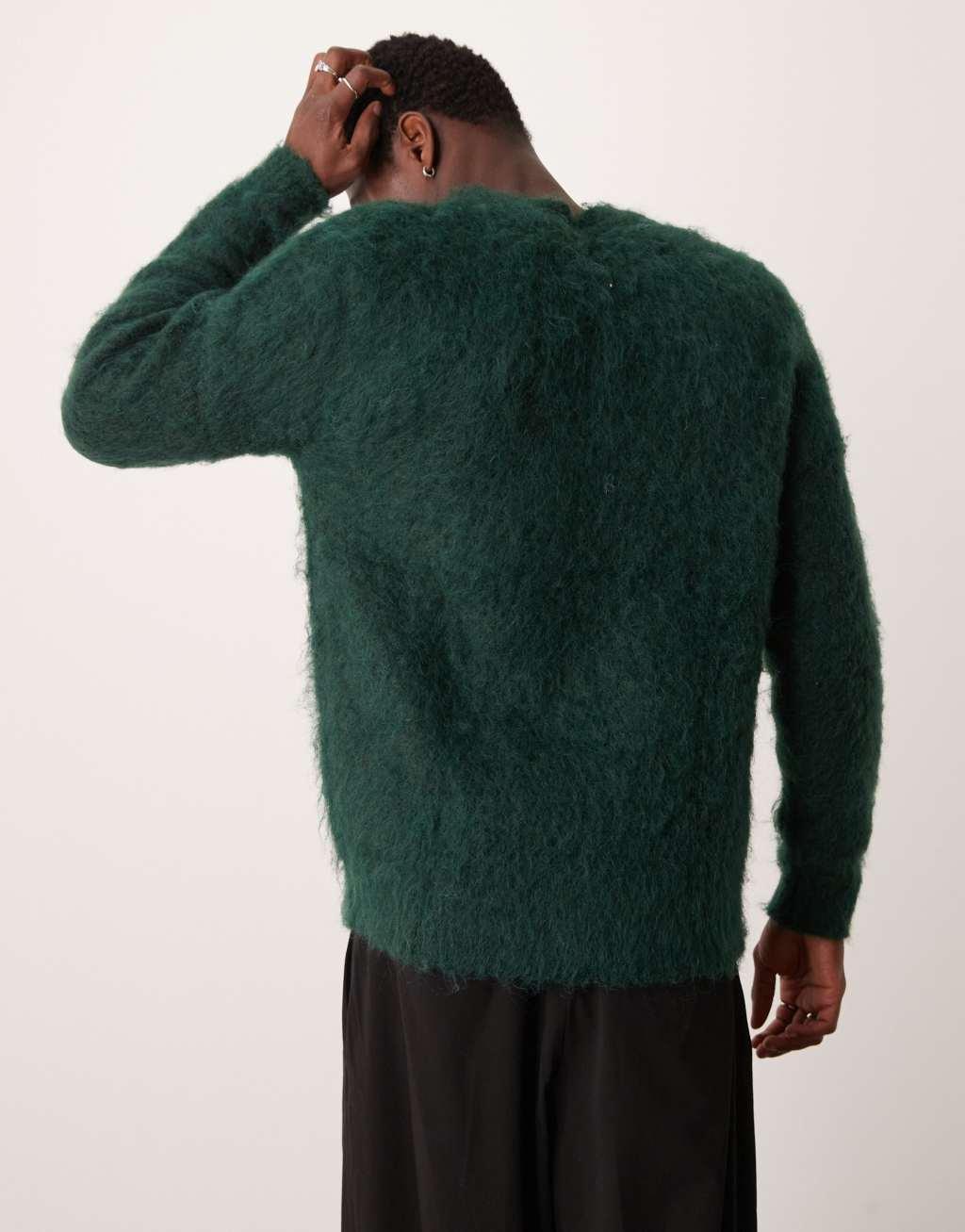 ASOS DESIGN knit fluffy sweater in dark green Product Image