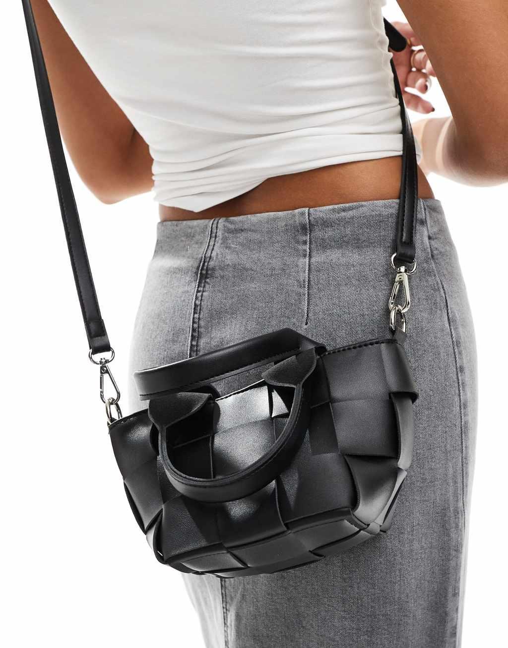 Glamorous woven bucket bag with crossbody strap in black Product Image