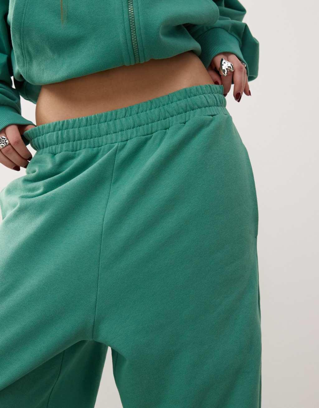 COLLUSION oversized sweatpants with embroidery in green - part of a set Product Image