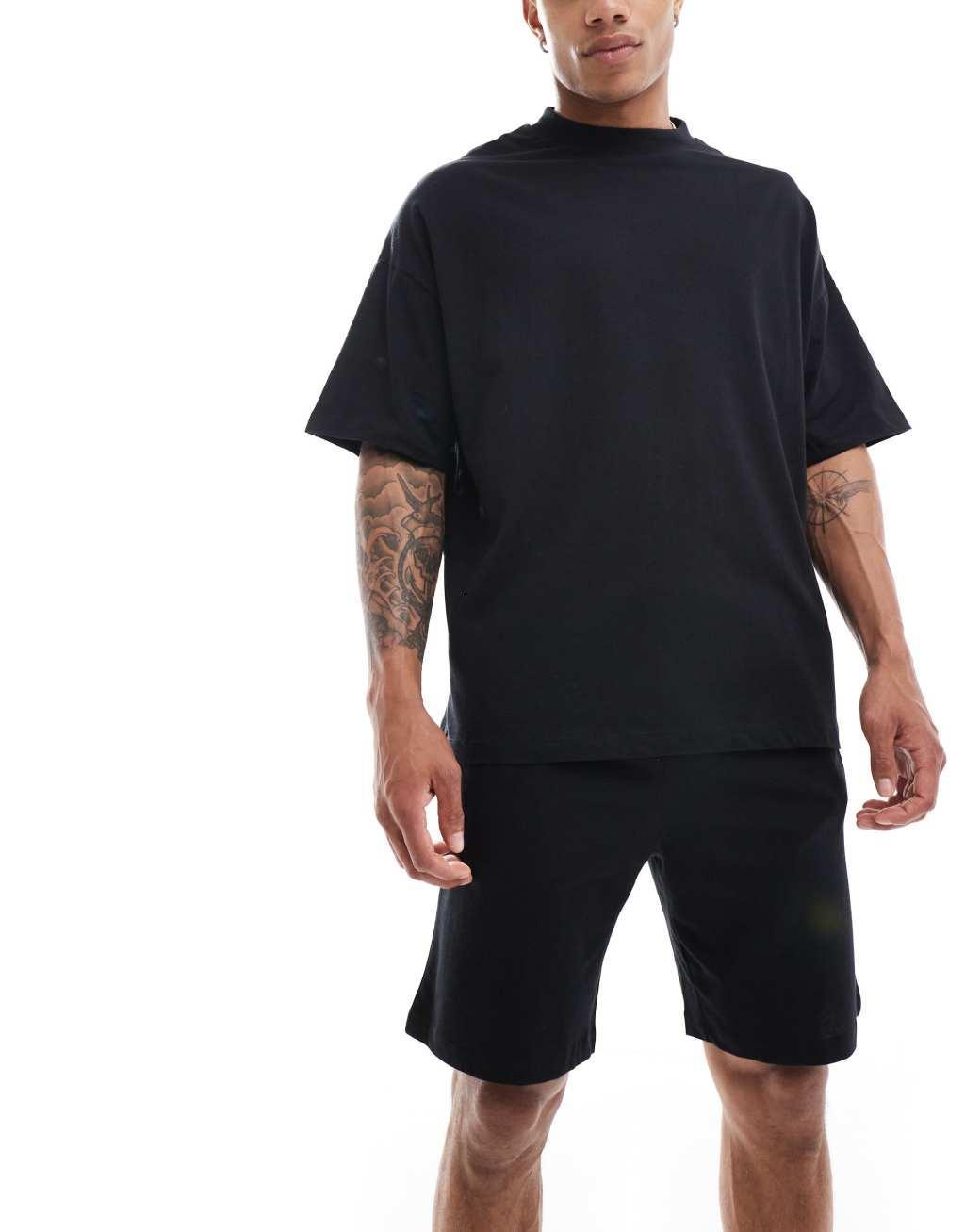 ASOS DESIGN pajama set with oversized t-shirt and shorts in jersey in black  Product Image