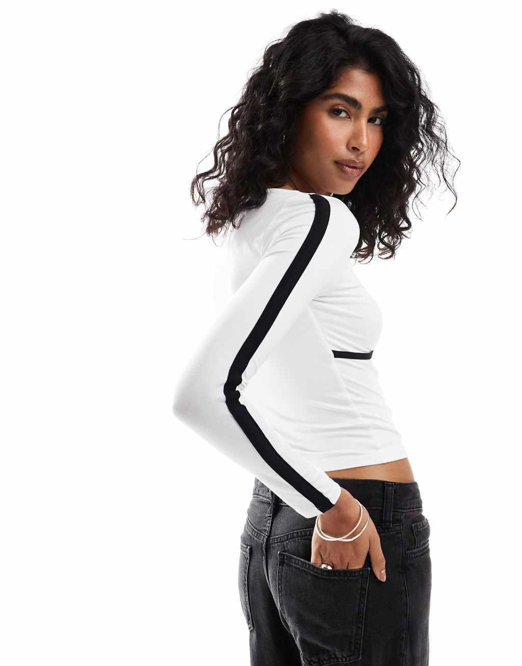 ASOS DESIGN underbust detail contrast binding top in white Product Image