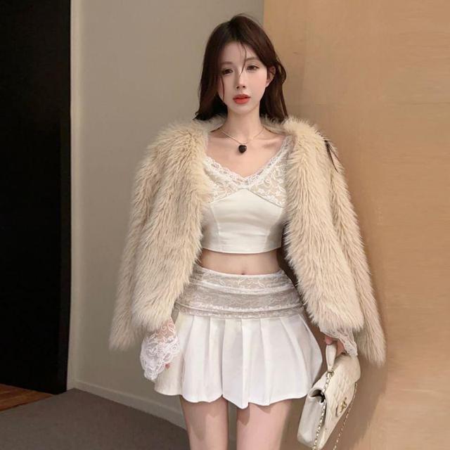 Set: Long-Sleeve Off Shoulder Lace Panel Crop Top + High Rise Plain Mini Pleated Skirt Product Image