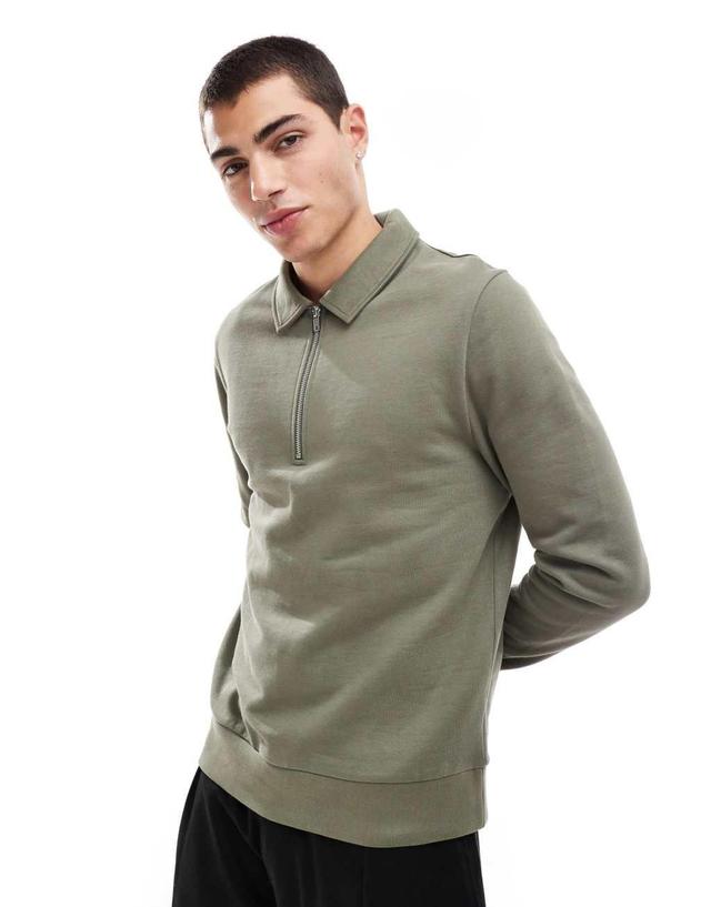 ASOS DESIGN polo sweatshirt with zipper in khaki Product Image