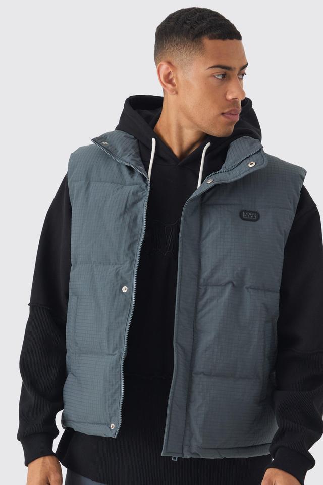 Man Tab Ripstop Funnel Neck Puffer Vest In Slate | boohooMAN USA Product Image