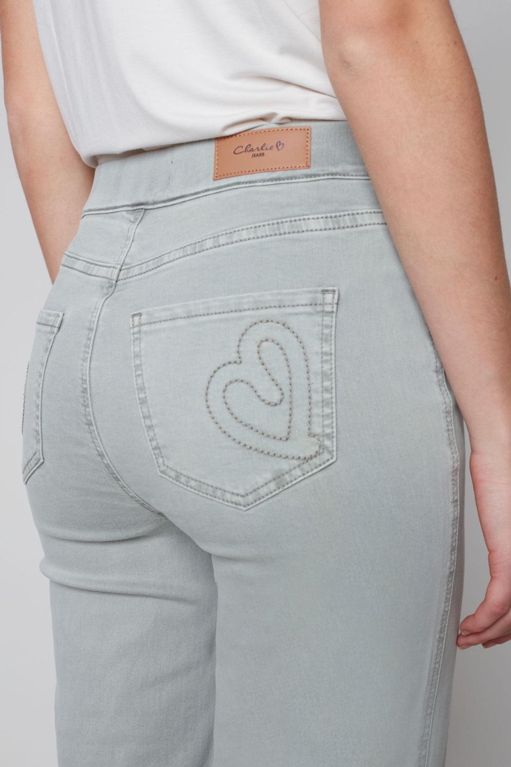 Pull on denim pant with side button detail Product Image