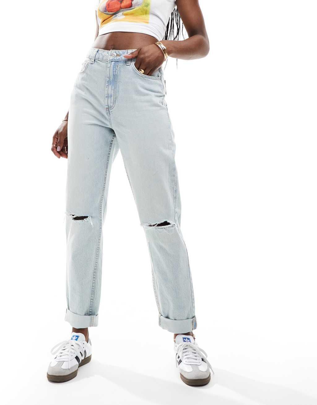 ASOS DESIGN high rise relaxed mom jeans in light blue with rip Product Image