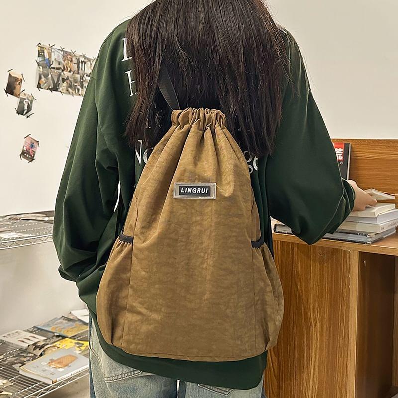 Lettering Applique Drawstring Nylon Backpack Product Image