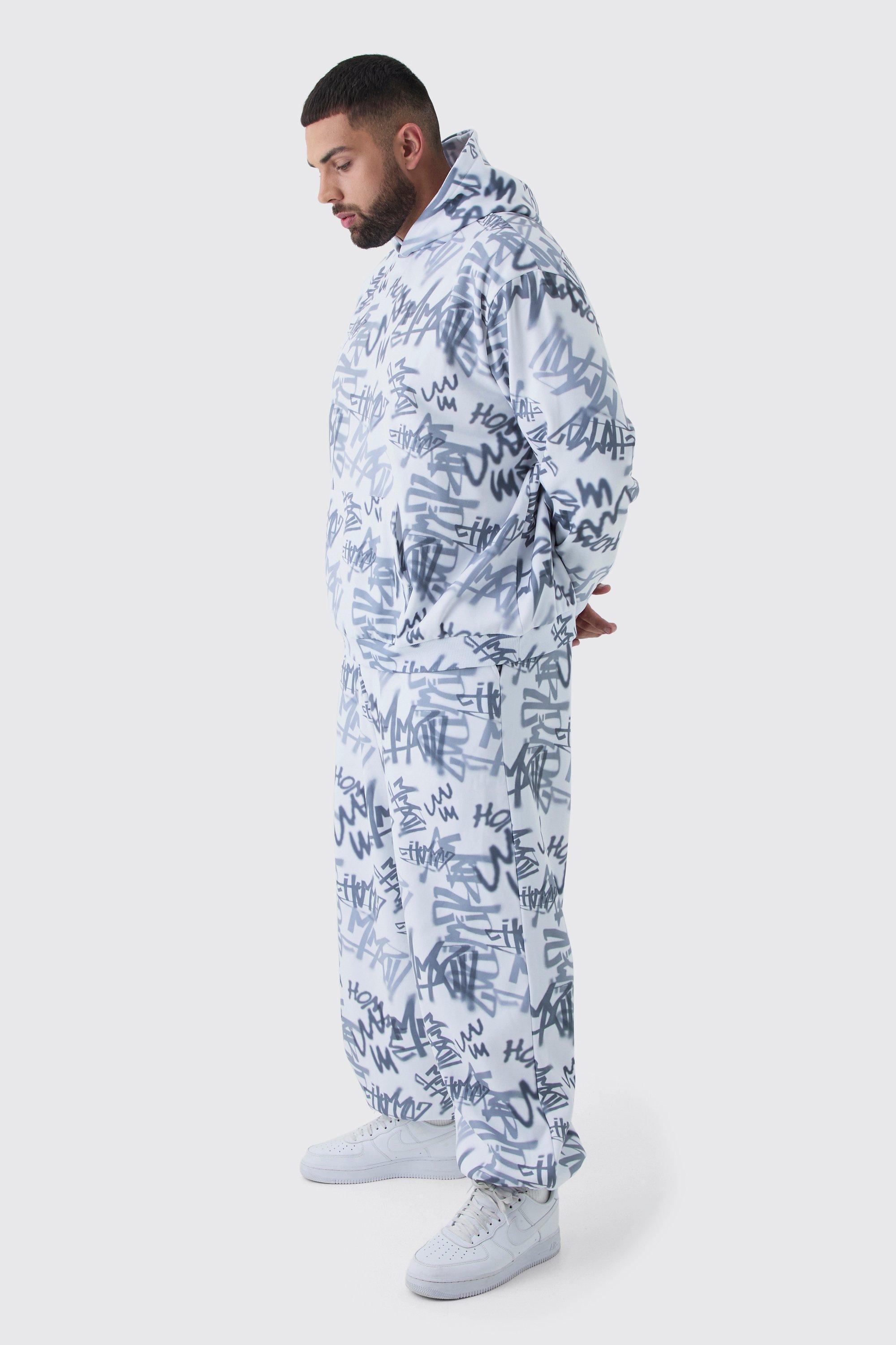 Plus Oversized Graffiti Print Hooded Wide Leg Tracksuit | boohooMAN USA Product Image