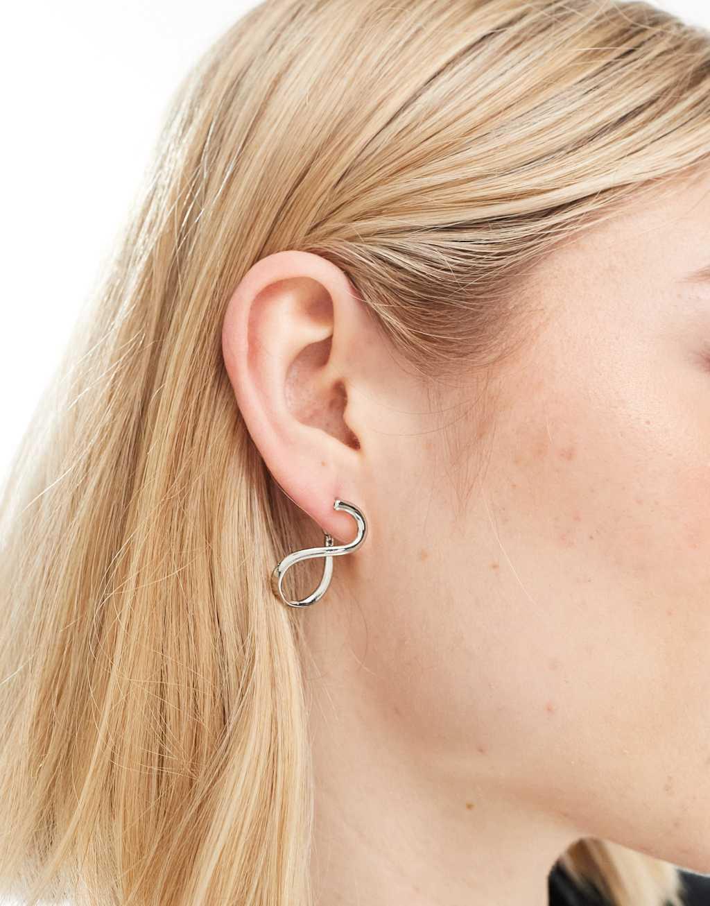 ASOS DESIGN hoop earrings with back and front clicker wiggle design in silver tone Product Image