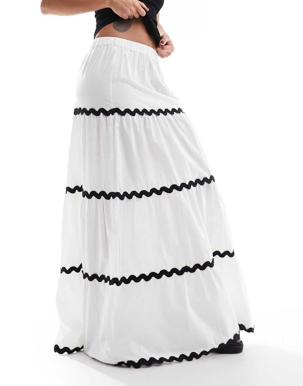 ASOS DESIGN tiered maxi skirt with rick rack detail in white Product Image