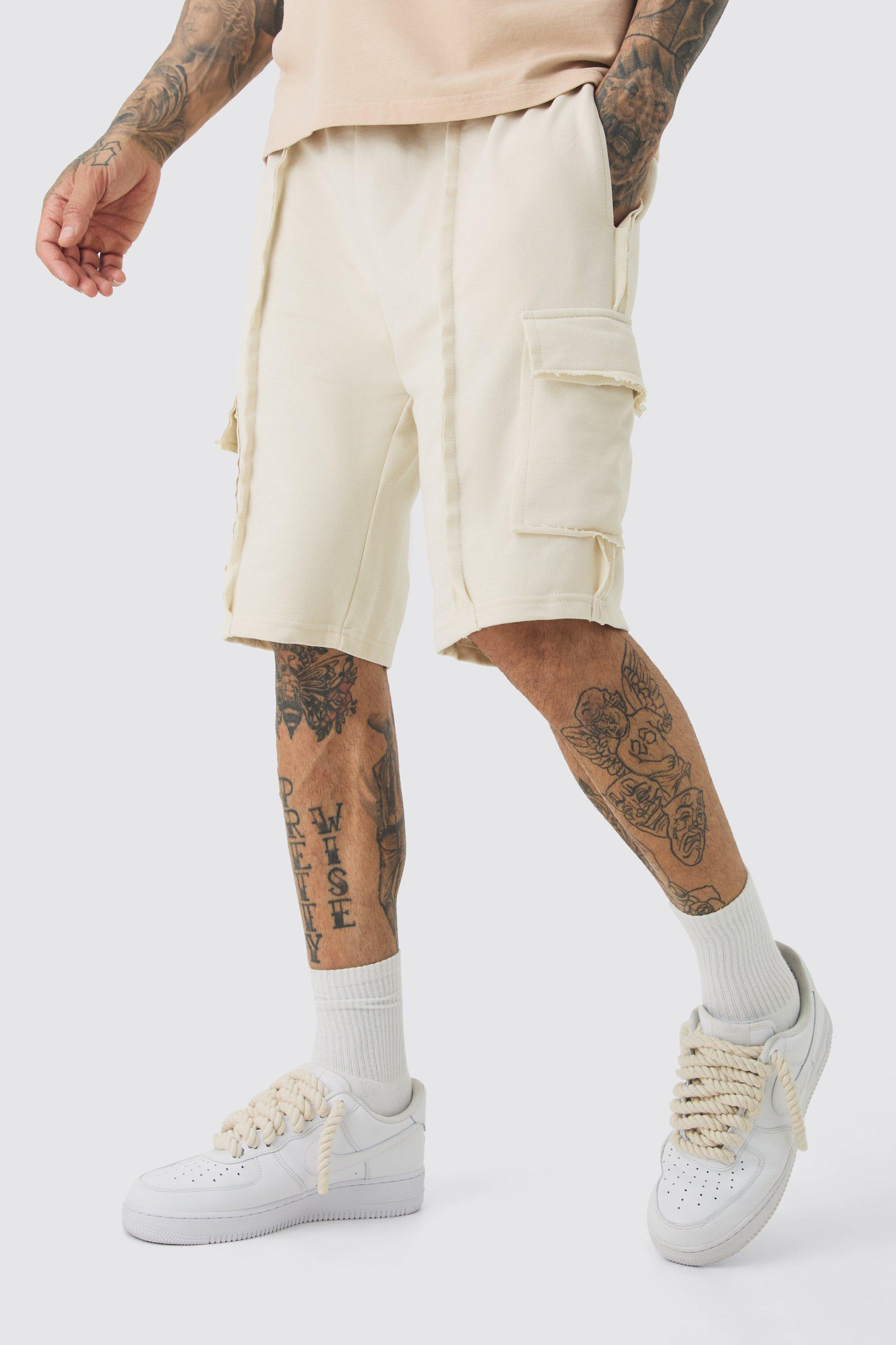 Tall Loose Fit Raw Interlock Seam Cargo Jersey Short | boohooMAN USA Product Image