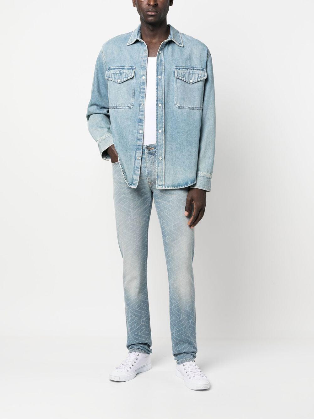 Geometric-print Washed Jeans In Blue Product Image