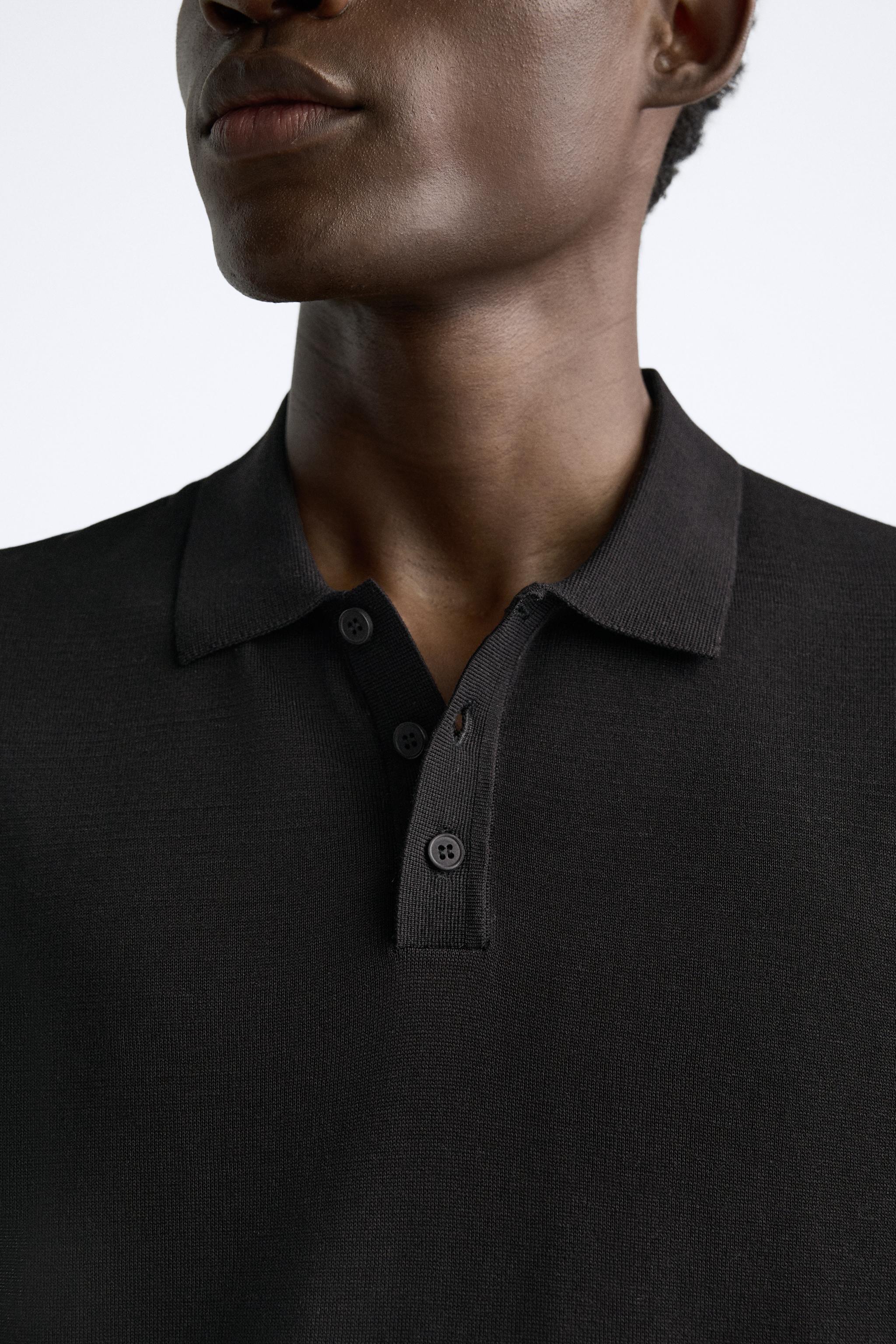 Cotton and silk blend polo shirt. Lapel collar with front button closure and short sleeves. Rib trim. Product Image