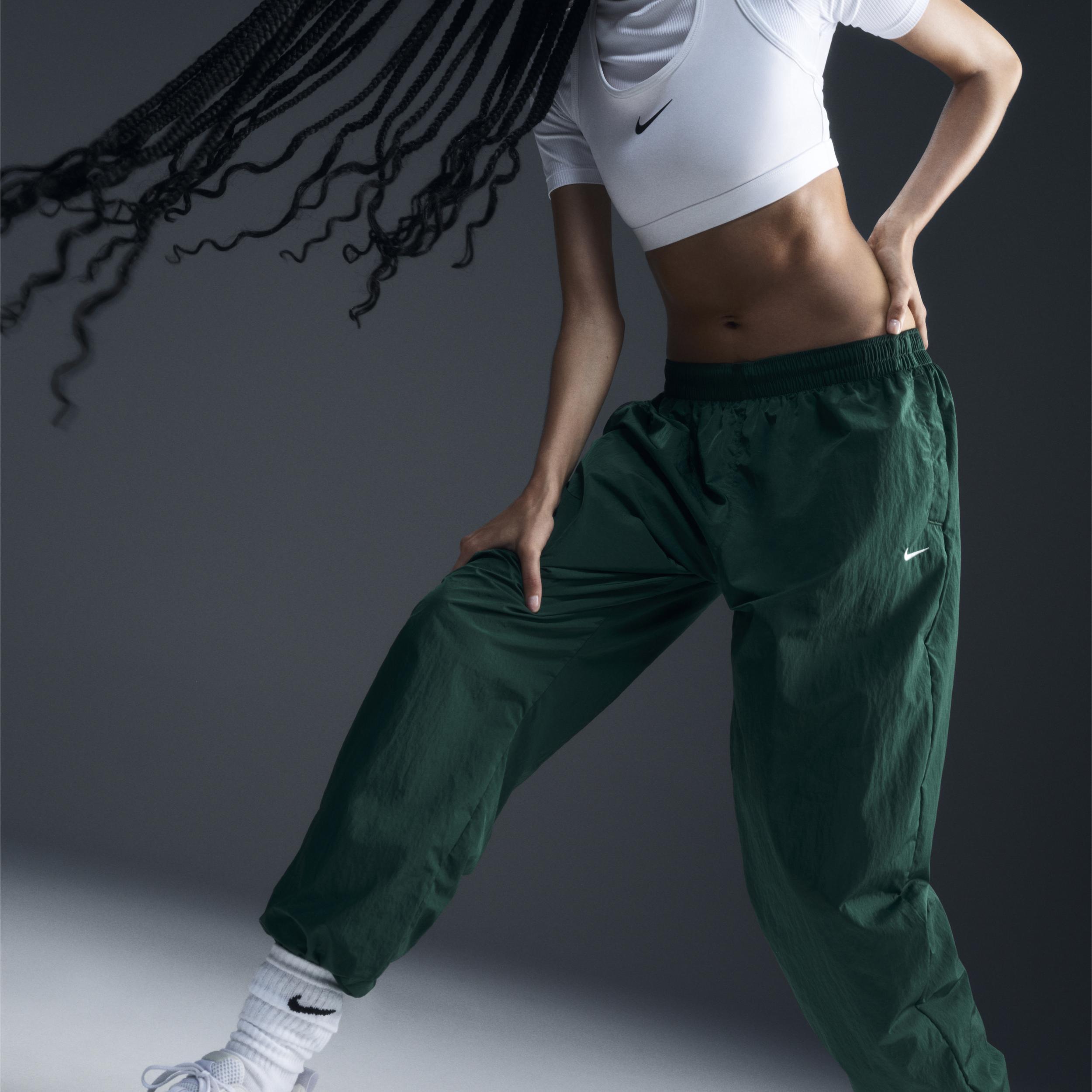 Womens Nike Sportswear Essential Mid-Rise Oversized Woven Jogger Pants Product Image