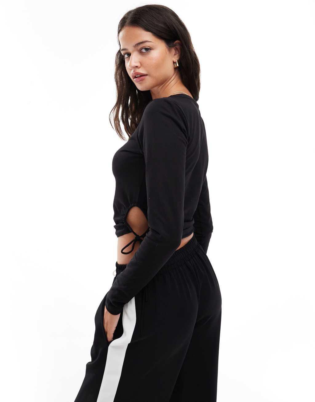 Pieces ruched tie side jersey top in black Product Image