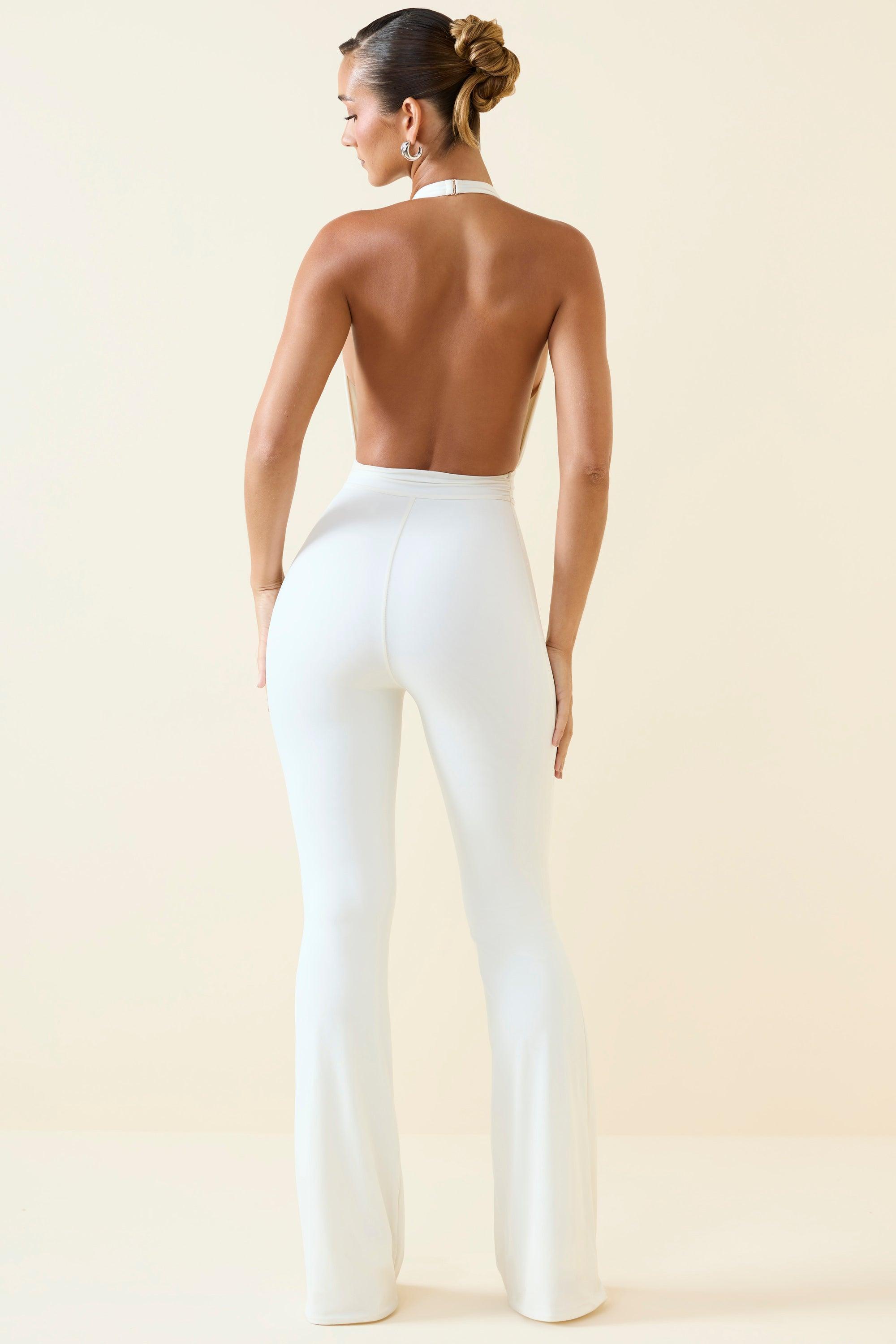 Halterneck Cut-Out Flared Jumpsuit in Vanilla Product Image